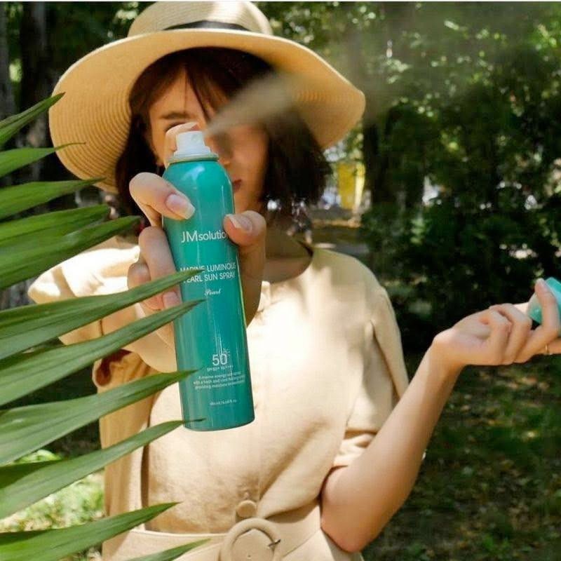 Xịt chống nắng JM solution màu xanh nâng tone nhẹ — ảnh chính